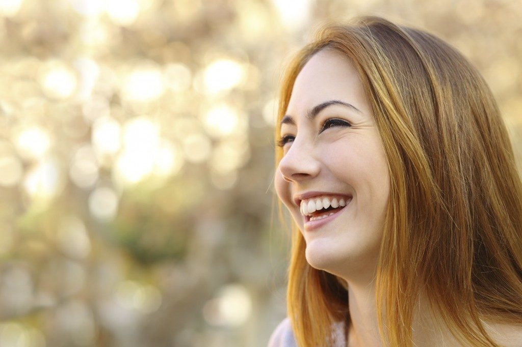 Solving Common Smile Problems - Dental Implants & Whitening